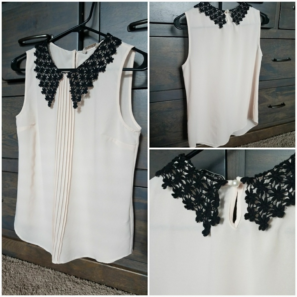 Anthropologie Blouse with knit colar.